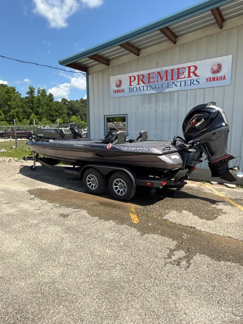 Slide: The Image of 2025 Skeeter ZXR21SE boat at Premier Boating Centers, featuring Yamaha engine. - 7