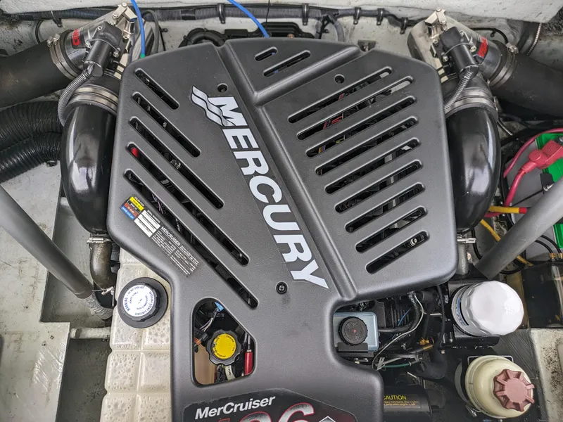 Slide: The Image of Engine of a 2008 Chris-Craft Corsair 25 with Mercury MerCruiser components. - 15