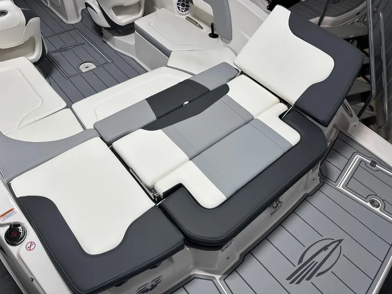 Slide: The Image of 2025 Chaparral 23 SSi boat interior with adjustable seating and modern design. - 7
