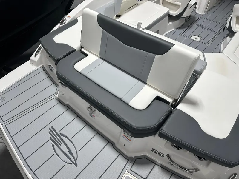 Slide: The Image of 2025 Chaparral 23 SSi boat interior with stylish seating and modern design. - 8