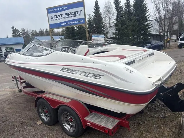 Slide: The Image of 2002 Ebbtide 210 Campione boat on trailer at Boat Sport dealership. - 5