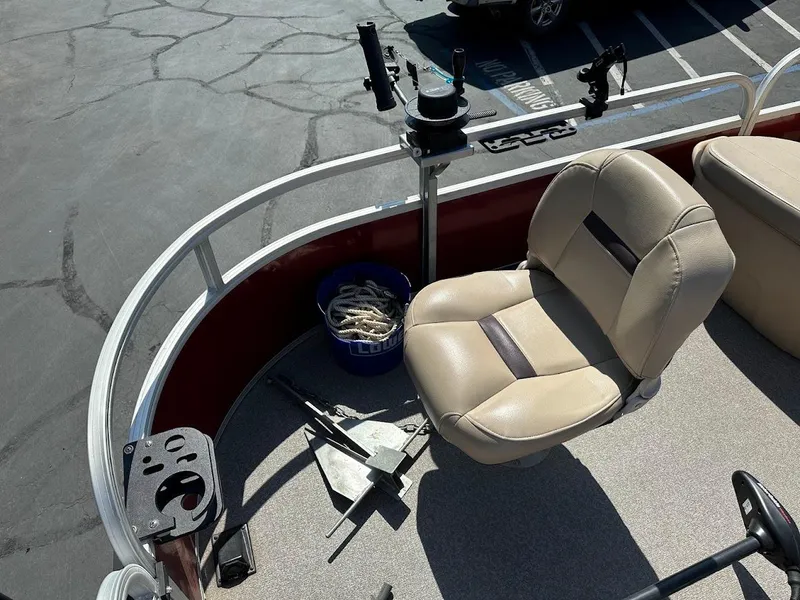 Slide: The Image of 2019 Sun Tracker Bass Buggy 18 DLX boat interior with fishing seat and equipment. - 10