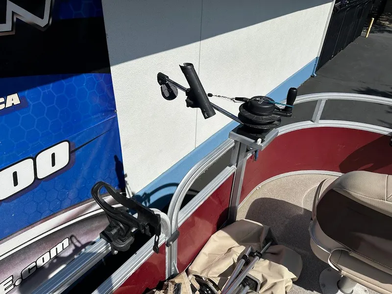 Slide: The Image of 2019 Sun Tracker Bass Buggy 18 DLX boat with fishing rod holders and seating. - 15