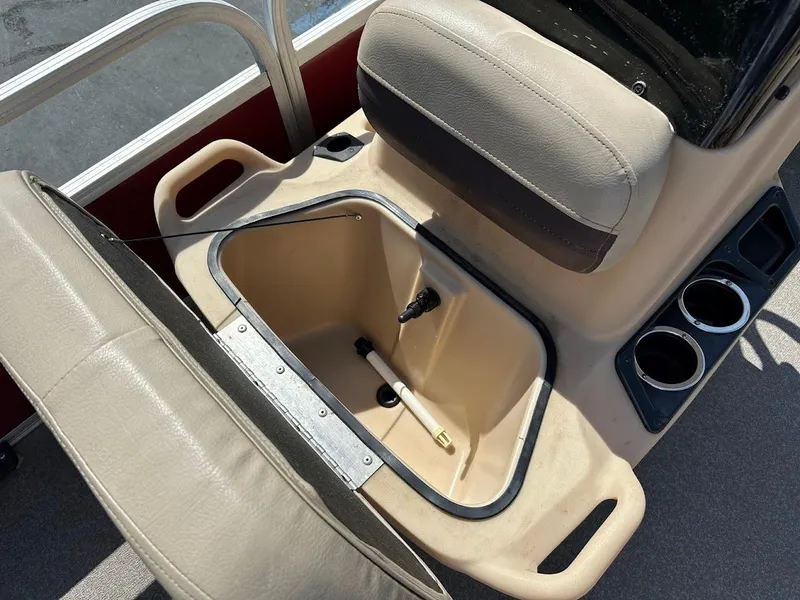 Slide: The Image of 2019 Sun Tracker Bass Buggy 18 DLX boat seat with storage compartment and cup holders. - 17