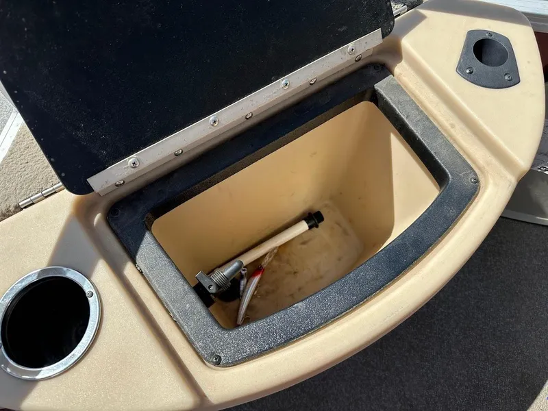 Slide: The Image of Open storage compartment on 2019 Sun Tracker Bass Buggy 18 DLX boat. - 25