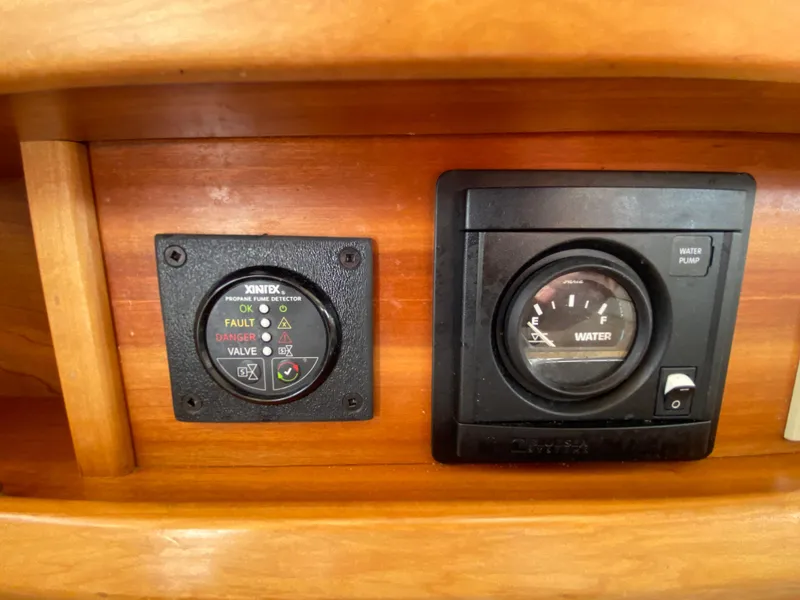 Slide: The Image of Control panel on 2017 Cutwater C-28 boat, featuring water level and system indicators. - 34