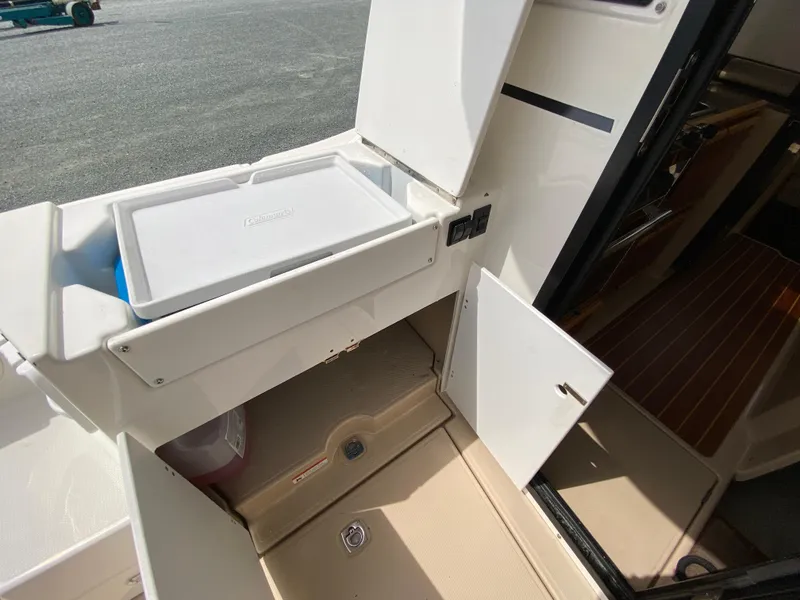 Slide: The Image of 2017 Cutwater C-28 boat interior with storage compartments and deck view. - 41