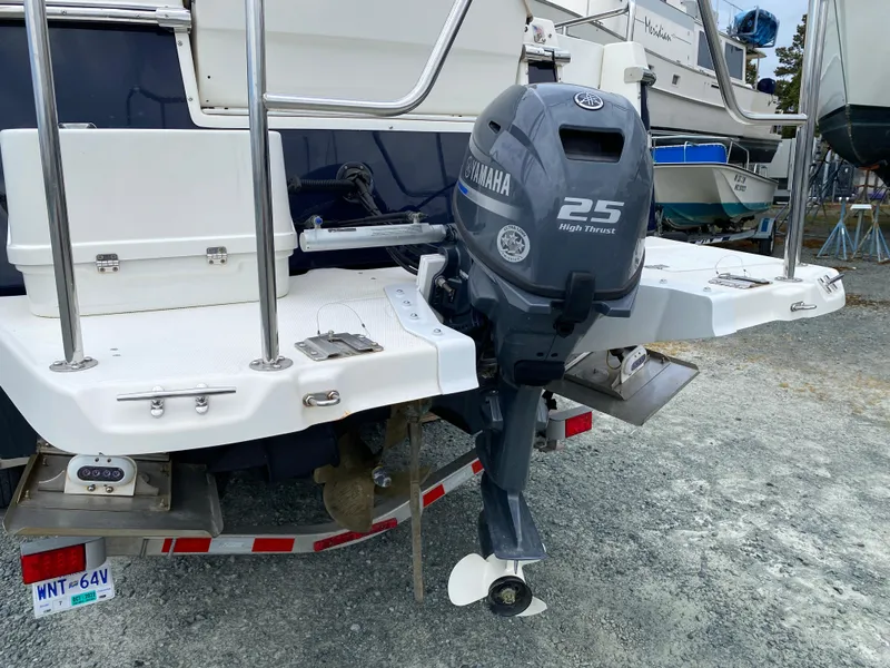 Slide: The Image of 2017 Cutwater C-28 boat with Yamaha 25 outboard motor on trailer. - 49