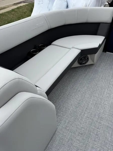 Slide: The Image of 2025 Harris Cruiser 230 interior with sleek seating and modern design. - 8