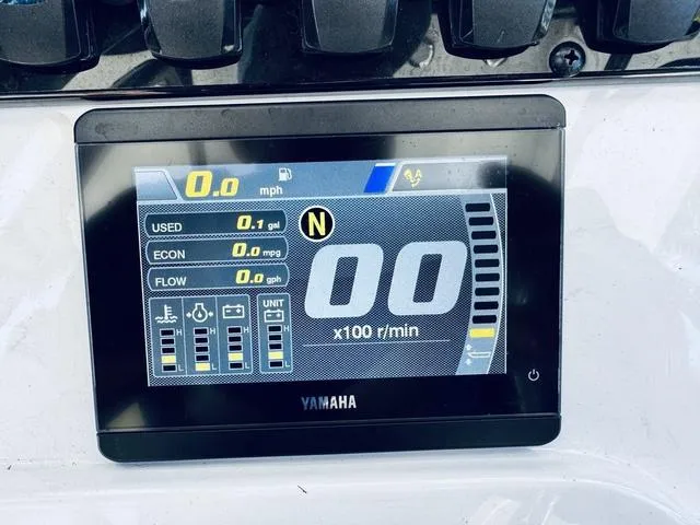 Slide: The Image of Digital display on 2024 Sea Hunt Ultra 239 SE showing speed and fuel metrics. - 27