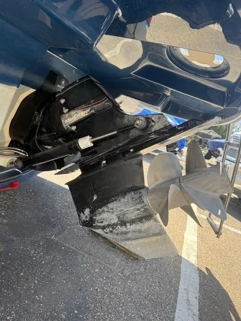 Slide: The Image of 2006 Sea Ray 220 Sundeck boat propeller and stern drive close-up. - 25