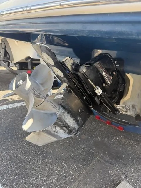 Slide: The Image of 2006 Sea Ray 220 Sundeck boat propeller and stern drive close-up. - 26