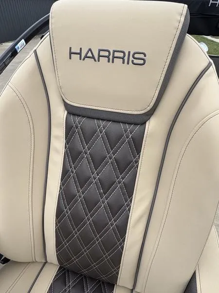 Slide: The Image of 2025 Harris Sunliner 230 boat seat with beige and brown quilted design. - 10