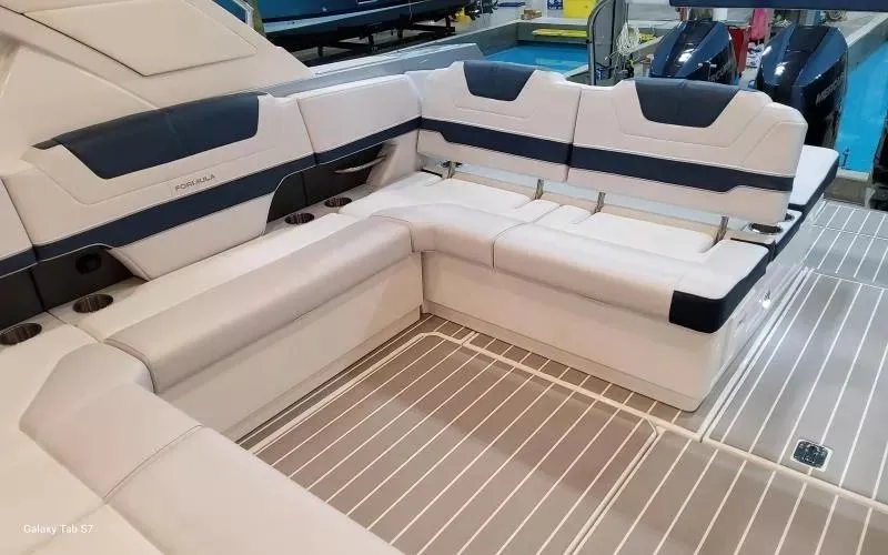Slide: The Image of 2025 Formula 400 Super Sport Crossover boat interior with luxurious seating and modern design. - 10