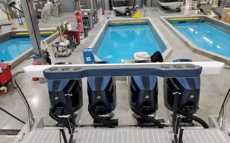 Slide: The Image of 2025 Formula 400 Super Sport Crossover with Mercury engines in a testing facility. - 8