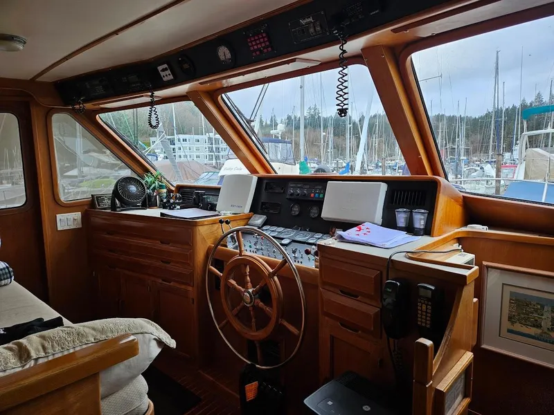 Slide: The Image of 1987 DeFever 53 POC yacht side deck with scenic waterfront view. - 14