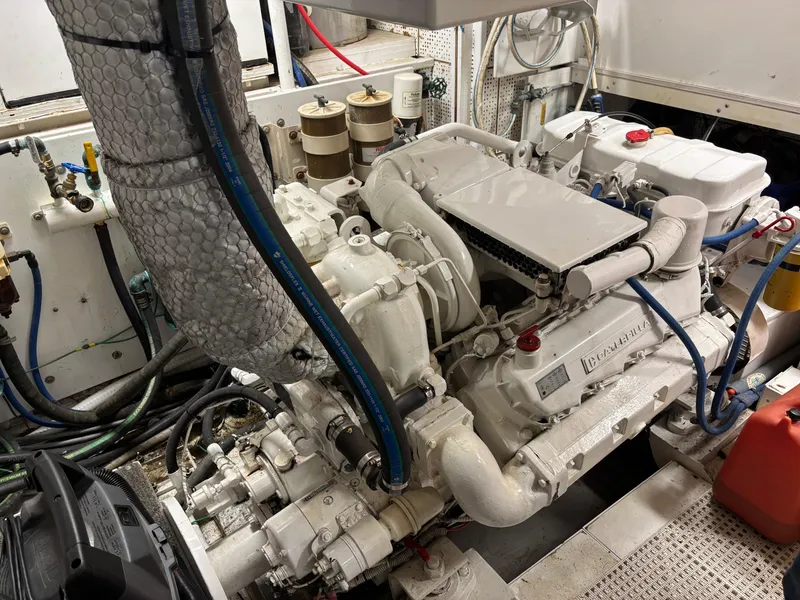 Slide: The Image of Control panel inside a 1987 DeFever 53 POC yacht, featuring various switches and gauges. - 32