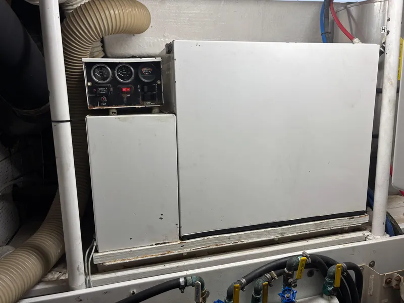 Slide: The Image of Luxurious interior of 1987 DeFever 53 POC yacht with panoramic windows and elegant seating. - 34