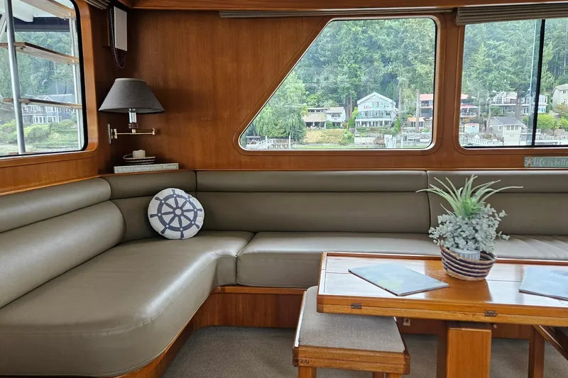 Slide: The Image of Interior of 1987 DeFever 53 POC yacht with wooden cabinetry and waterfront view. - 39