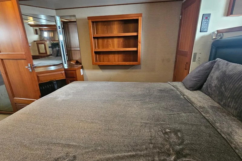 Slide: The Image of 1987 DeFever 53 POC yacht interior with wooden cabinetry and bunk bed. - 52
