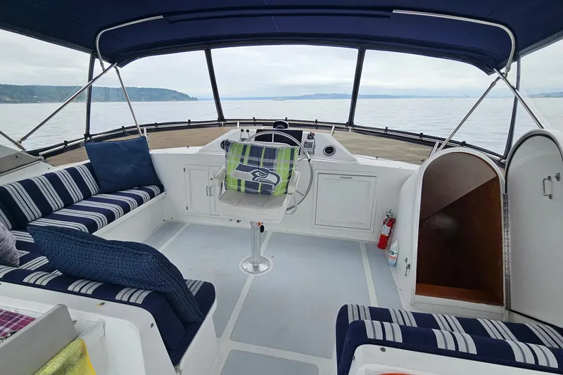 Slide: The Image of 1987 DeFever 53 POC yacht docked at marina, side view. - 6