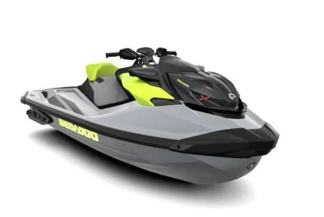 Slide: The Image of 2024 Sea-Doo RXP-X 325 jet ski, gray and yellow design, side view. - 2