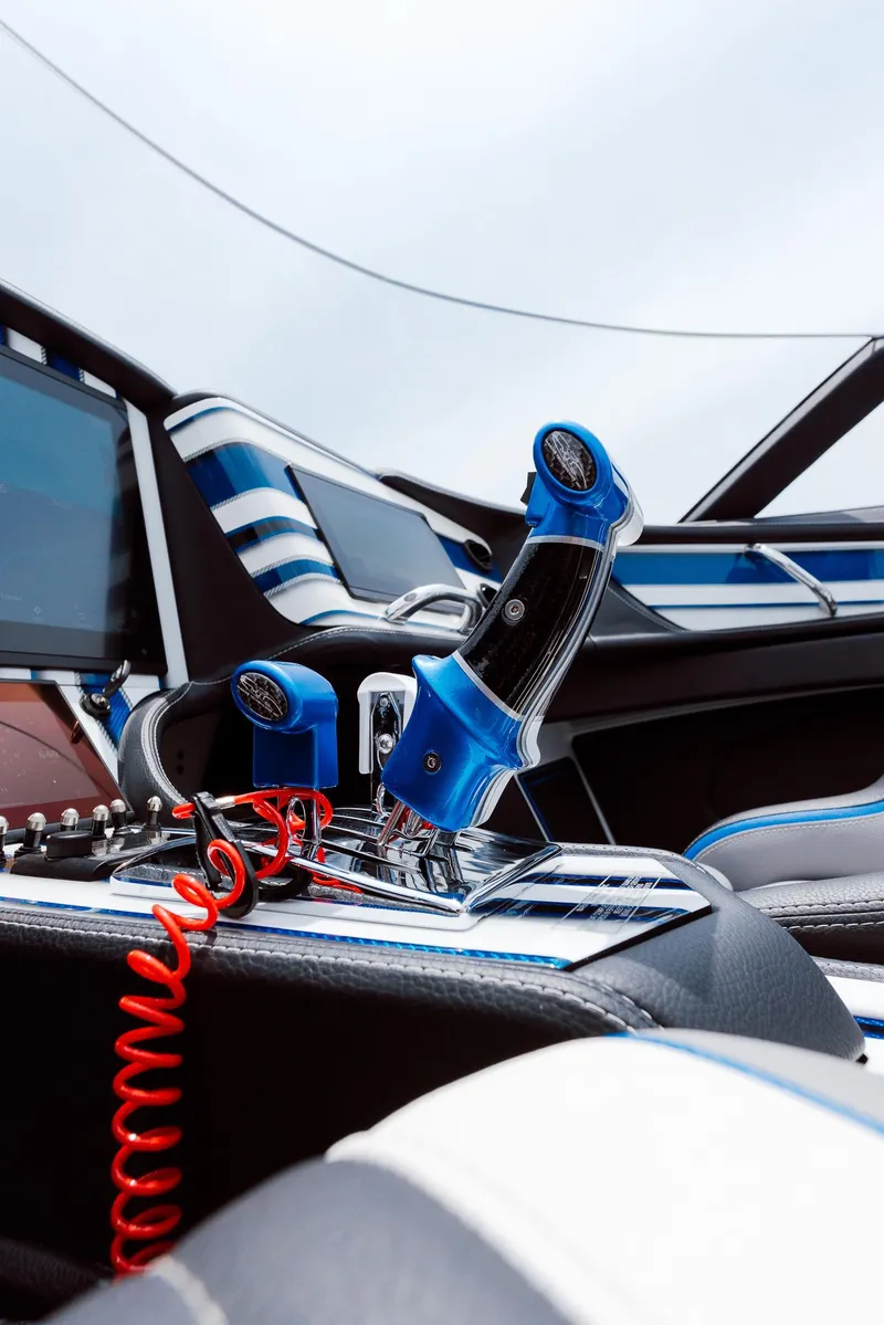 Slide: The Image of 2024 MTI 440X interior with blue accents and advanced control system. - 42