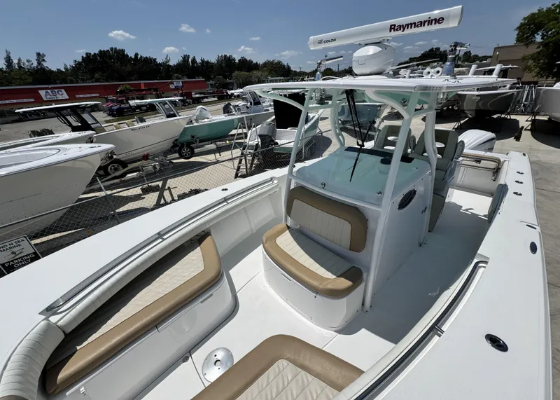 Slide: The Image of 2015 Southport 29 FE boat with Raymarine radar, docked among other boats. - 18