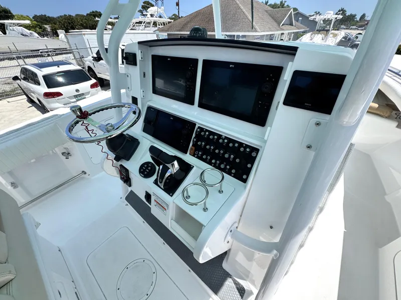 Slide: The Image of 2015 Southport 29 FE boat dashboard with modern navigation and control systems. - 24