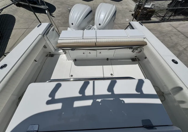 Slide: The Image of 2015 Southport 29 FE boat deck with dual engines and seating area. - 29