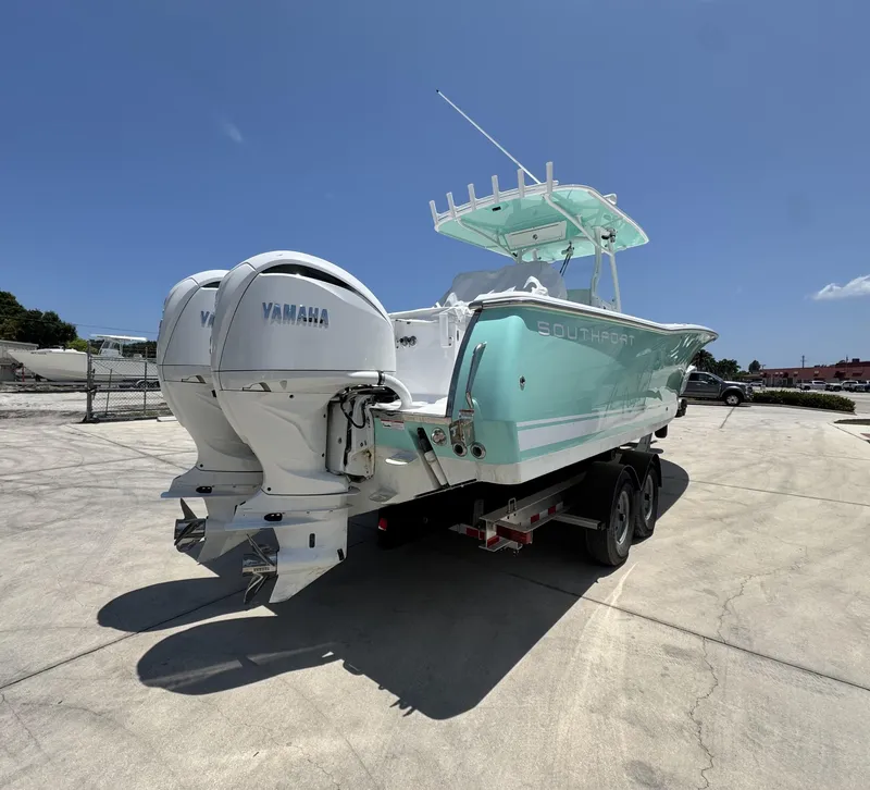Slide: The Image of 2015 Southport 29 FE boat with twin Yamaha engines on a trailer. - 5