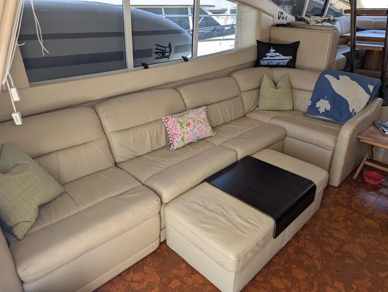 Slide: The Image of Luxurious beige leather seating in 2003 Cruisers Yachts 5000 Sport Sedan interior. - 50