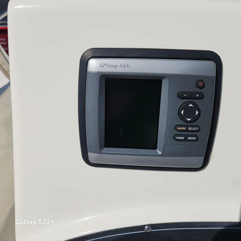 Slide: The Image of Garmin GPSmap 441s on 2010 Boston Whaler 190 Outrage boat dashboard. - 13