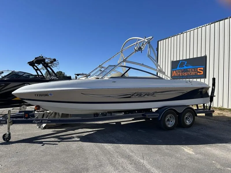 Slide: The Image of 2007 Tigé 22Ve boat on trailer at West Texas Watersports dealership. - 4