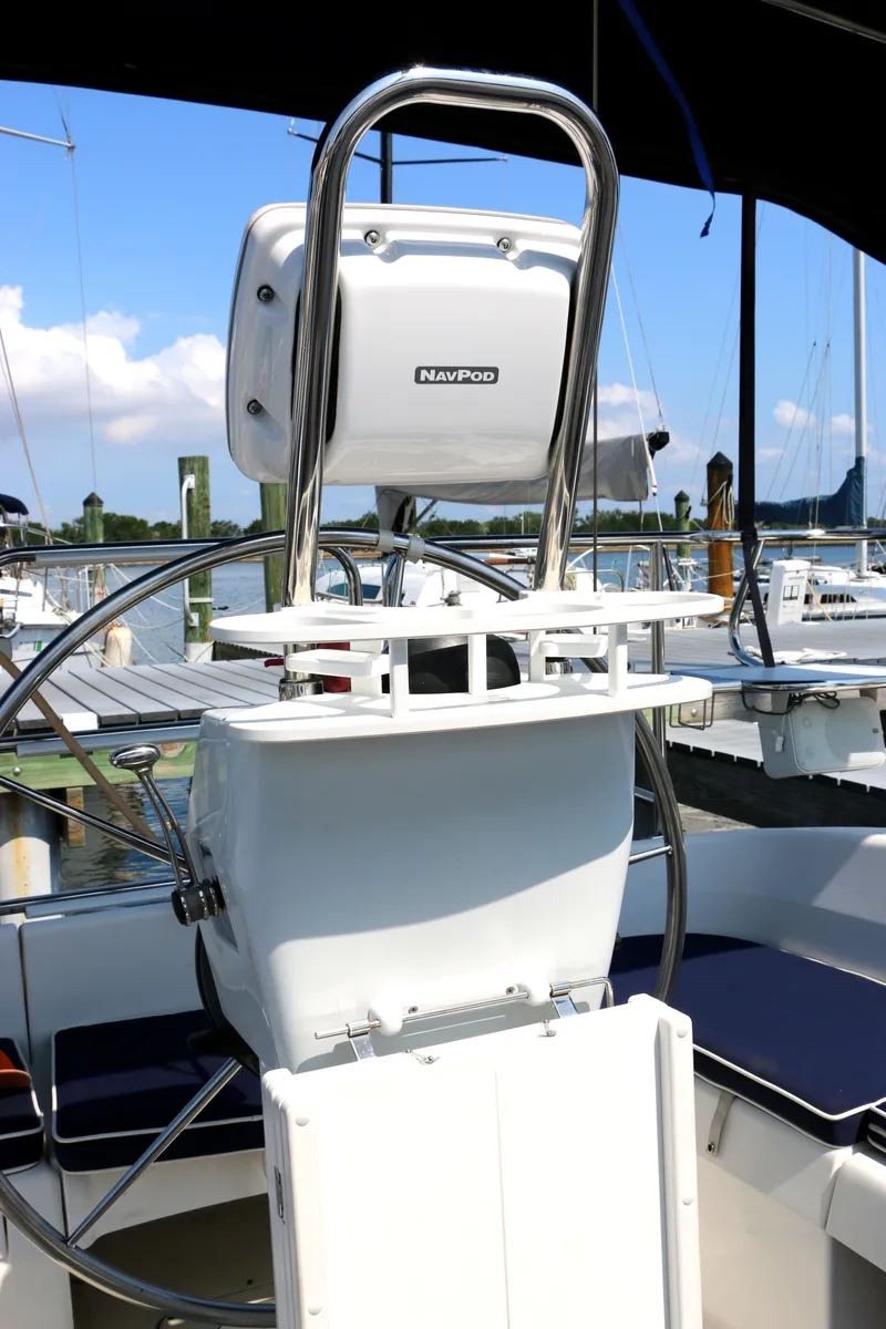 Slide: The Image of 2006 Catalina 350 sailboat helm with Navpod, docked in marina. - 6