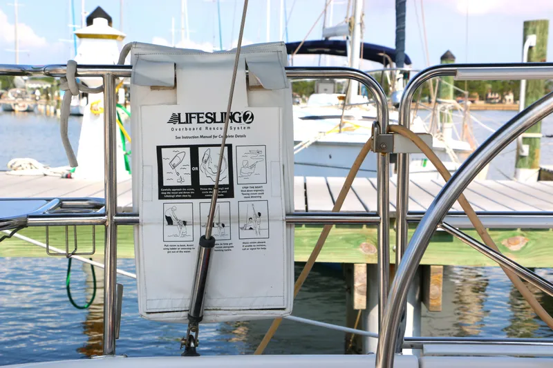 Slide: The Image of Lifesling2 rescue device on 2006 Catalina 350 sailboat, docked at marina. - 8
