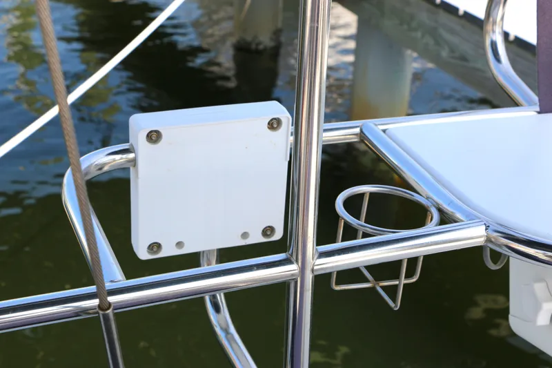 Slide: The Image of Stainless steel railings on a 2006 Catalina 350 sailboat with cup holder. - 9