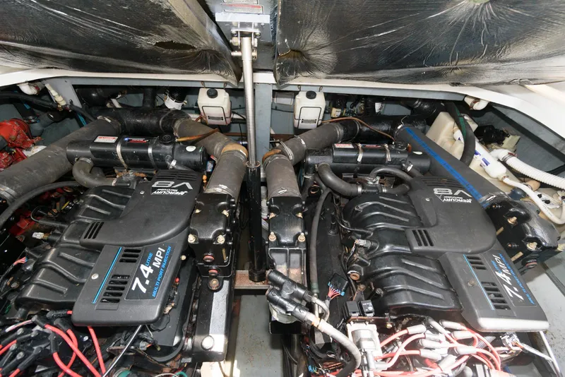 Slide: The Image of Engine room of 2000 Sea Ray 340 Sundancer with twin 7.4L MPI engines. - 17