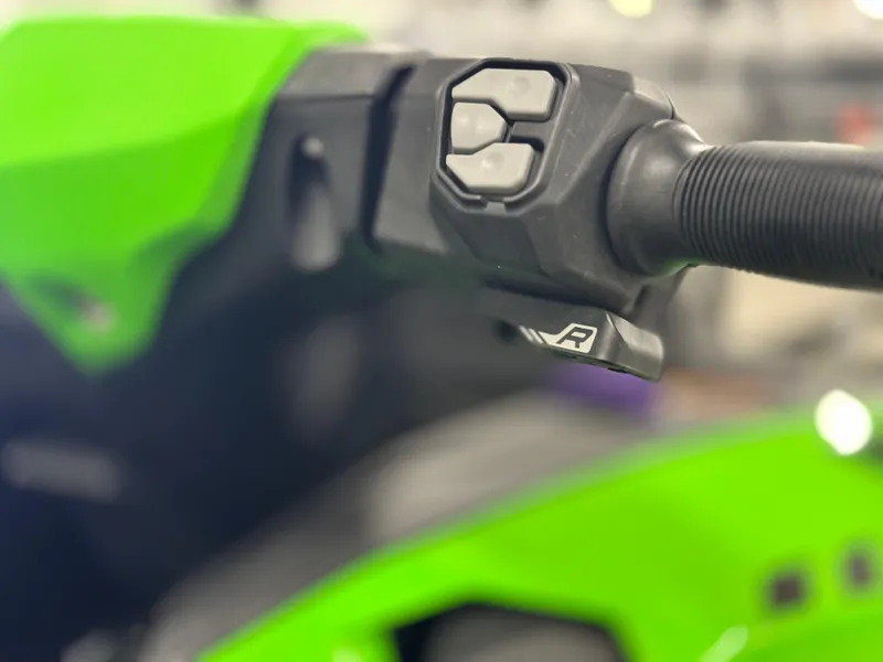 Slide: The Image of Close-up of 2023 Kawasaki Jetski Ultra 310LX-S handlebar controls. - 10