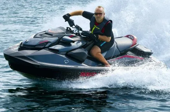 Slide: The Image of 2024 Sea-Doo GTR-X 300 jet ski on water, rider enjoying high-speed performance. - 5