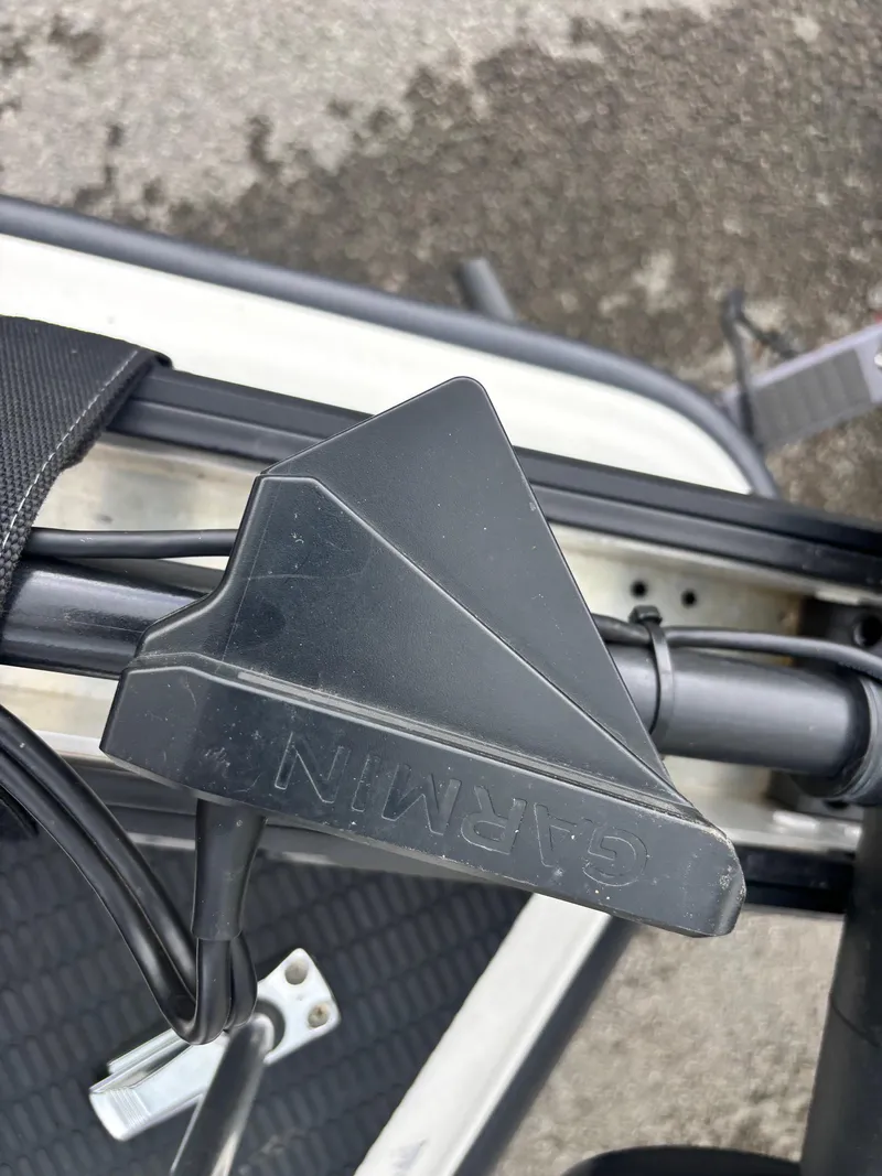 Slide: The Image of Close-up of a Garmin device on a 1999 Triton TR19 boat. - 4