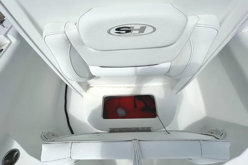 Slide: The Image of 2017 Sea Hunt Ultra 235 SE boat seat with storage compartment. - 17