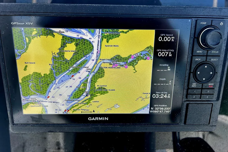 Slide: The Image of Garmin GPS display on 2017 Sea Hunt Ultra 235 SE, showing detailed nautical map. - 19