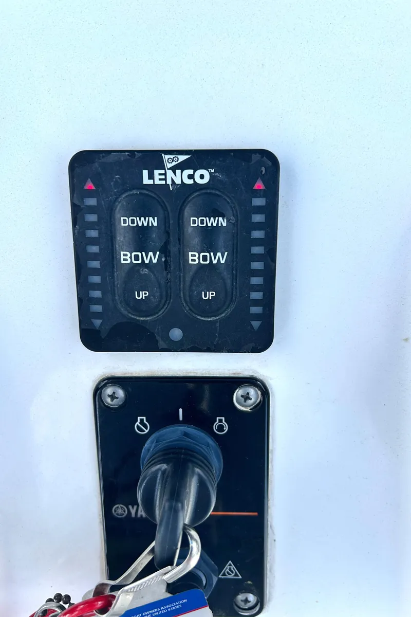 Slide: The Image of Lenco trim tab controls on 2017 Sea Hunt Ultra 235 SE boat. - 24