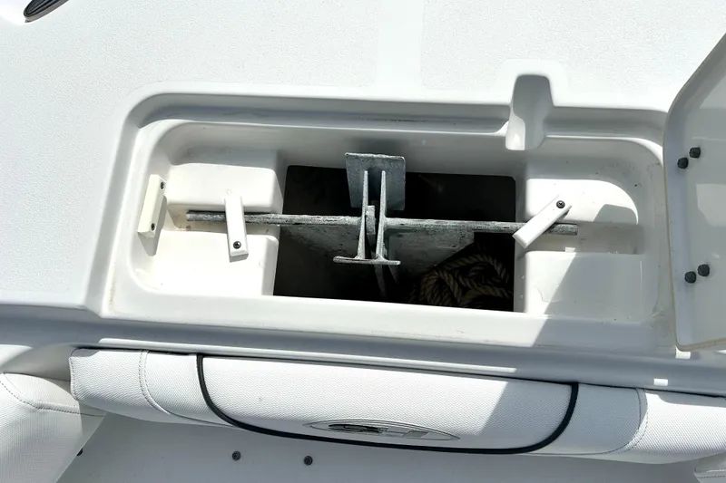 Slide: The Image of Anchor storage compartment on a 2017 Sea Hunt Ultra 235 SE boat. - 25
