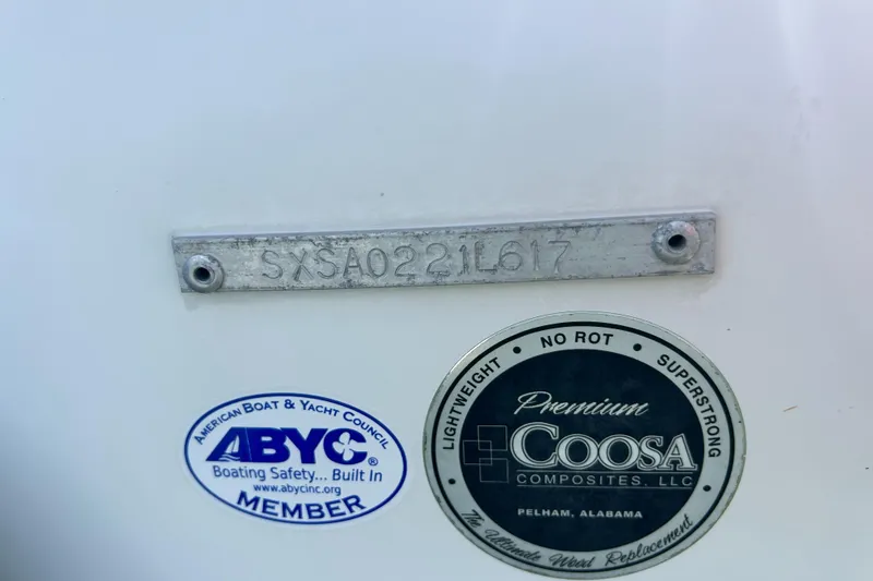 Slide: The Image of 2017 Sea Hunt Ultra 235 SE boat identification plate and certification stickers. - 28