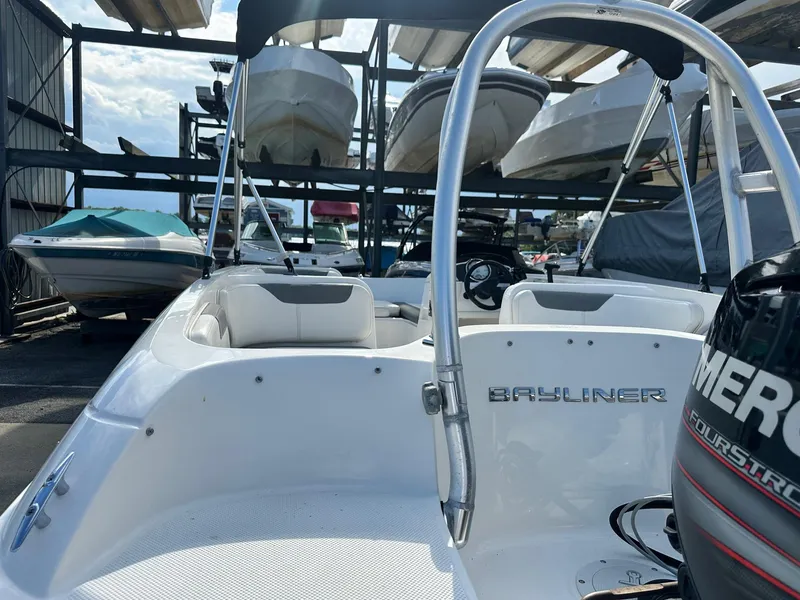 Slide: The Image of 2015 Bayliner Element 180 XL boat with Mercury engine in storage facility. - 11