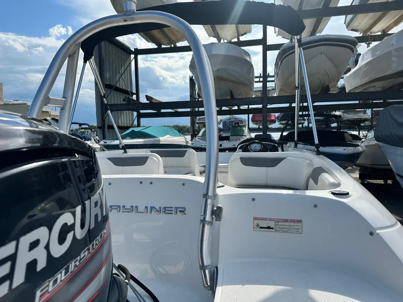 Slide: The Image of 2015 Bayliner Element 180 XL boat with Mercury engine in marina storage. - 12