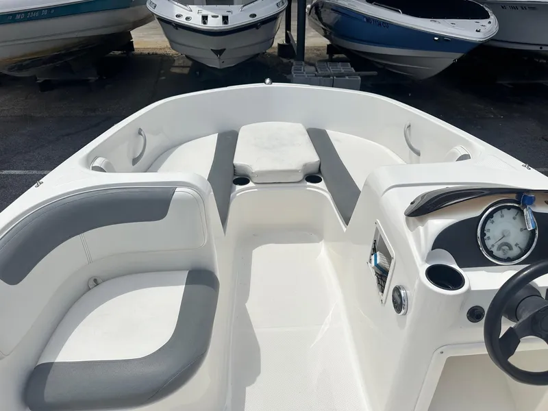 Slide: The Image of 2015 Bayliner Element 180 XL boat interior with seating and dashboard. - 20