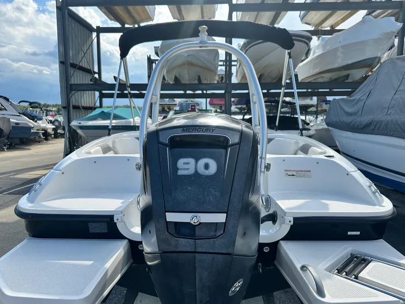 Slide: The Image of 2015 Bayliner Element 180 XL with Mercury 90 engine, docked in a marina. - 8